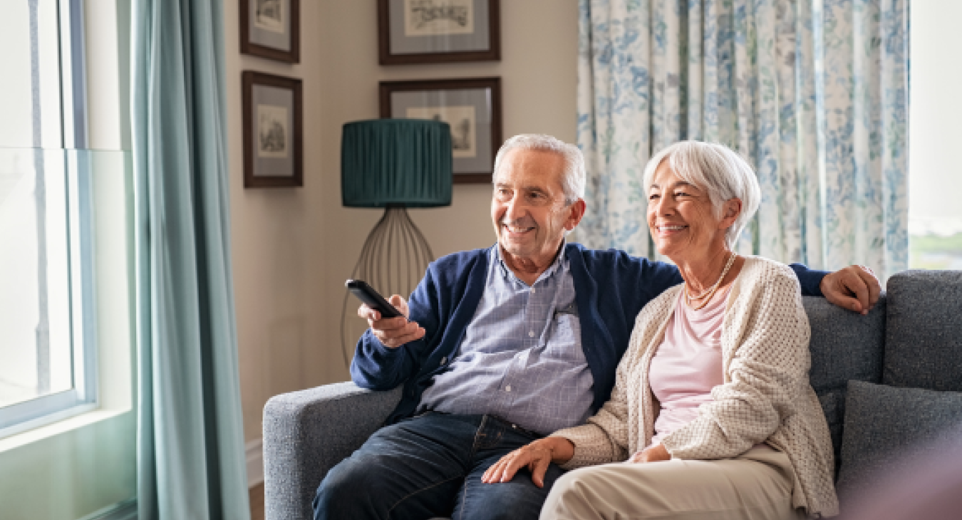 Older couple watching TV